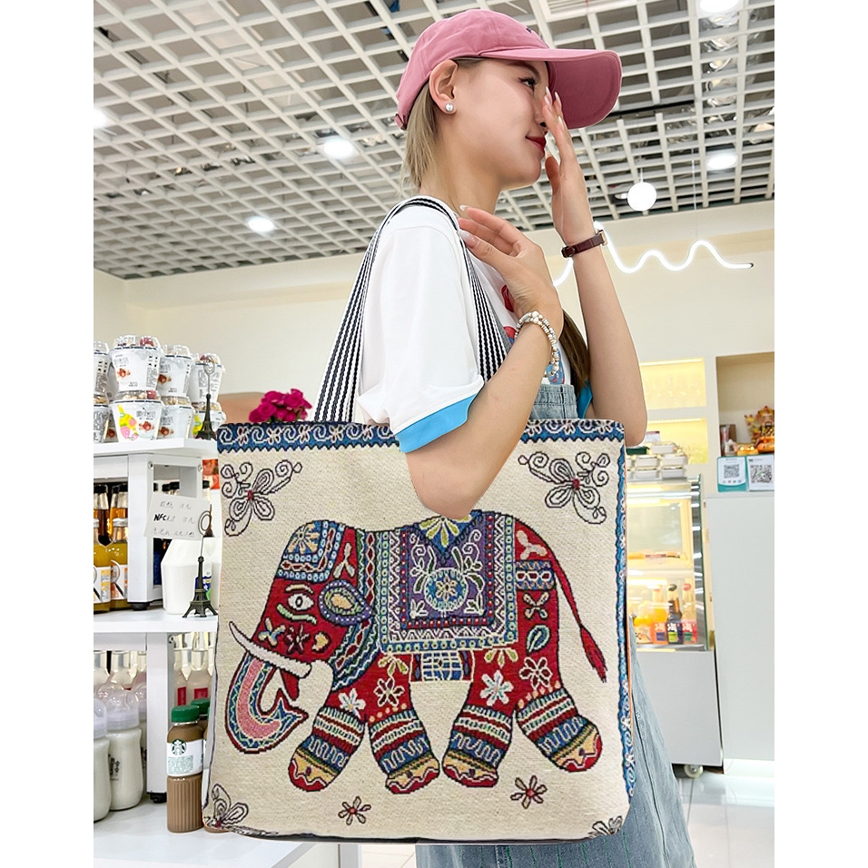 กระเป๋าสะพายไหล่ กระเป๋าช้อปปิ้งกระเป๋าถือ ฉบับพื้นเมืองสําหรับสตรี ลายช้างและลายม้า ใบใหญ่ใส่ของได้เยอะ มีซิป ปิด/เปิด👜