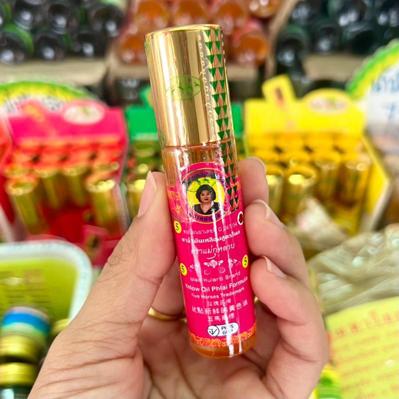 น้ำมันเหลืองสูตรไพล (ชนิดลูกกลิ้ง) Mae Kularb Brand Yellow Oil Phlai Formula Five Horses Trademark
