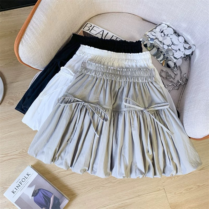 Lisaพร้อมส่ง กระโปรงสั้นผู้หญิง ทรงพองๆ เอวสม๊อคเเต่งโบว์ กระโปรงบอลลูนสุดฮิต เนื้อผ้าครัช ใส่ไปทะเล ไปคาเฟ่ งานสวยสุดๆๆ