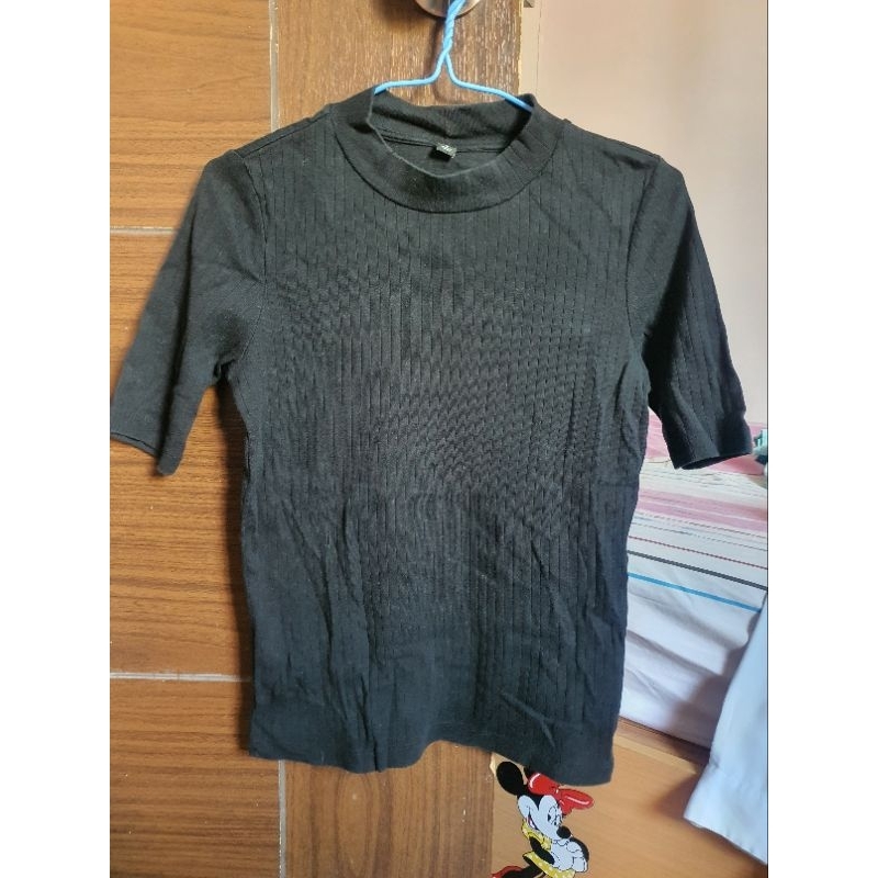 เสื้อ Uniqlo คือปีนสีดำไม่ซีด