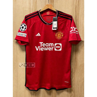 เสื้อ Man U. [เกรดแฟนบอล.]  เหย้า.  *Home Kits.* 2023-2024 [ฟูลออฟชั่น UCL.] ชื่อนักเตะ-เบอร์นักเตะ สำหรับUCL.