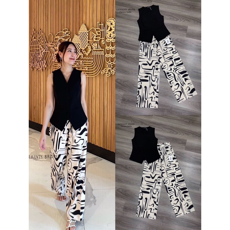 KATHALYN เซทเสื้อแขนกุดคอวี ทรงพอดีตัว แต่งกระดุมตรงกลางสีเดียวกันกับเสื้อ มาคู่กับกางเกงขายาวทรงสวยพิมพ์ลายสุดคลาสสิค