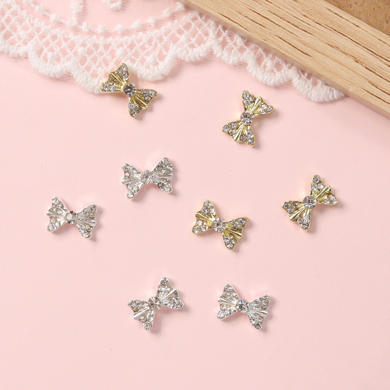 อะไหล่ตกแต่งเล็บ โบว์ โบว์ติดเล็บ โบว์เพชร สีเงิน สีทอง รหัส X-269/ X-270  ราคาต่อ1ชิ้น - รูปที่ 2