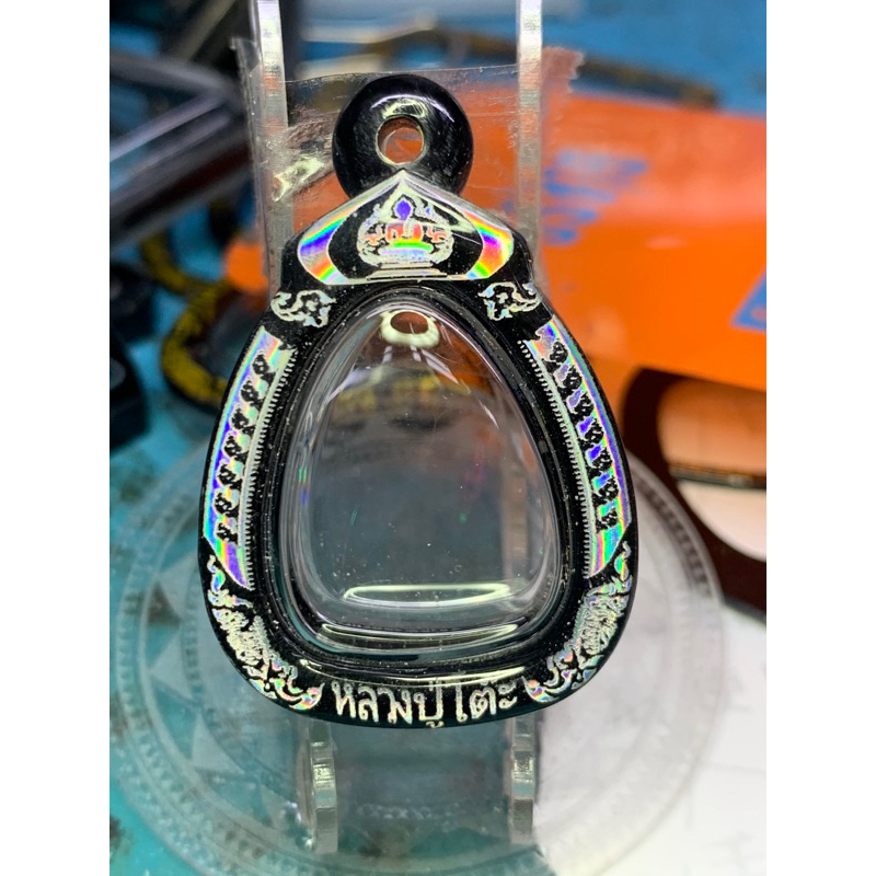 กรอบพระเลเซอร์หลวปู่โต๊ะปิดตาเล็กขนาดวงในกรอบกว้าง2.5/สูง2.7/หนา0.9cm