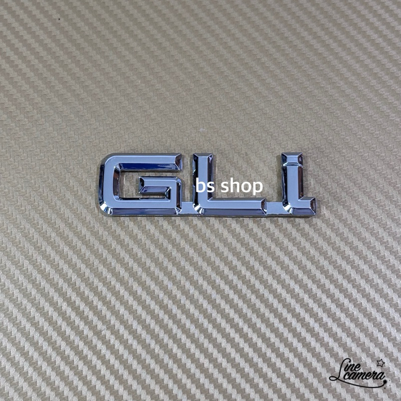 โลโก้ GLi สีชุบโครเมี่ยม ขนาด 2.5 x 8 cm ราคาต่อชิ้น