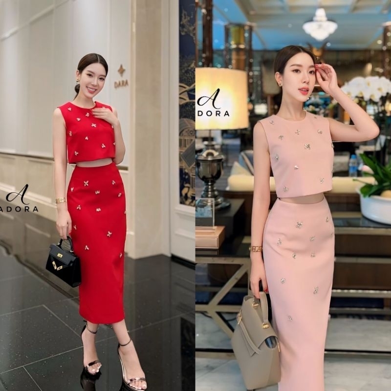 Adora ชุดเซ็ตเสื้อครอปแขนกุด+กระโปรงสวยหรู