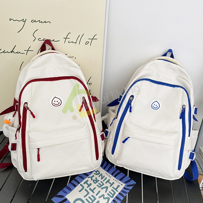 กระเป๋ารูปยิ้ม กระเป๋านักเรียน School bag เป้สะพายหลัง สำหรับผู้ชายเเละผู้หญิง มีหลายช่อง สายปรับได้
