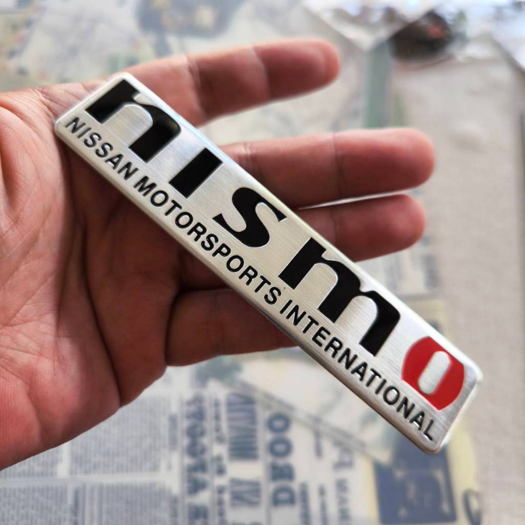 ส่งจากกรุงเทพ โลโก้ Nissan nismo มีกาวในตัว อลูมิเนียมบาง ขนาด 12×2.5Cm1อัน ราคา ถูกที่สุด ดีลบีเคเค