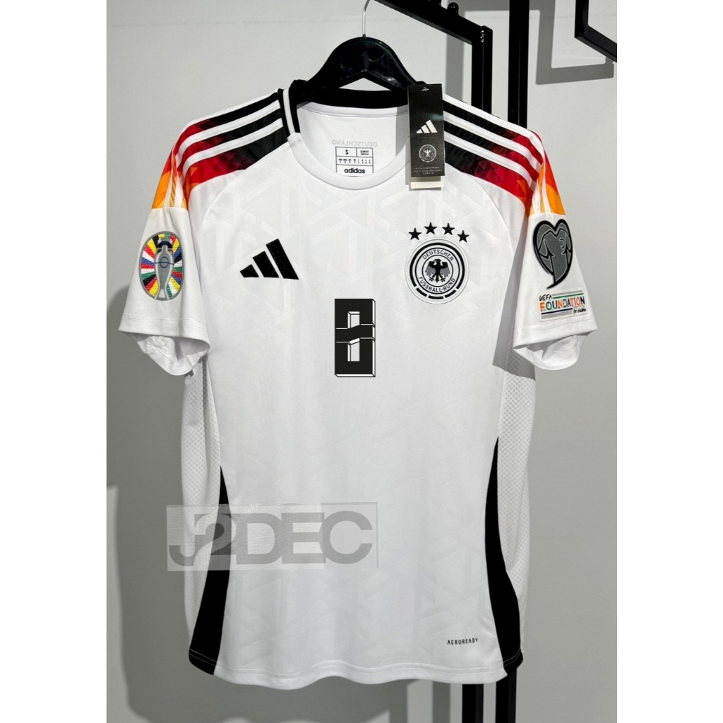 ใหม่ล่าสุด!!! เสื้อฟุตบอล ทีมชาติเยอรมัน Home ชุดเหย้า ยูโร 2024  [ 3A ] เกรดแฟนบอล สีขาว พร้อมชื่อเบอร์นักเตะ+อาร์มยูโร