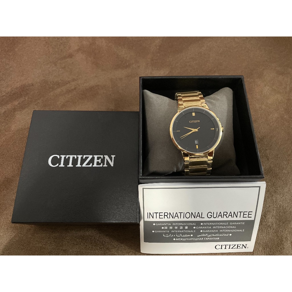 Citizen นาฬิกาข้อมือชายเรือนทองหน้าปัดดำ