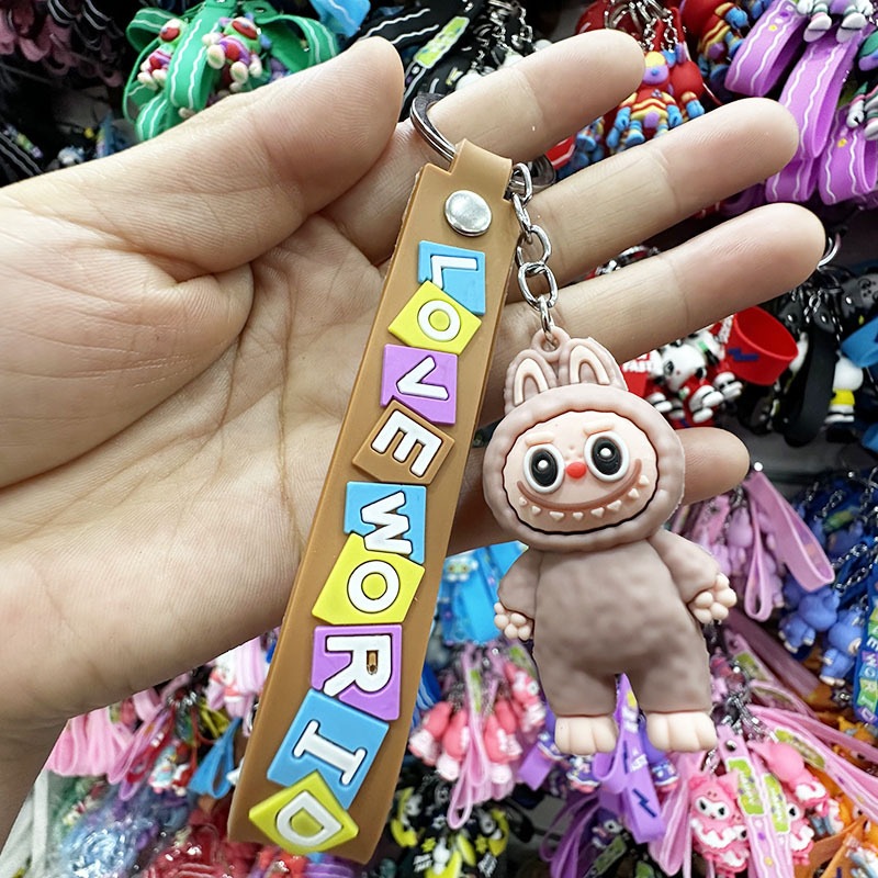 พวงกุญแจ จี้ตุ๊กตาการ์ตูน Labubu PVC ป้องกันการสูญหาย แบบสร้างสรรค์ มี4สี（001）
