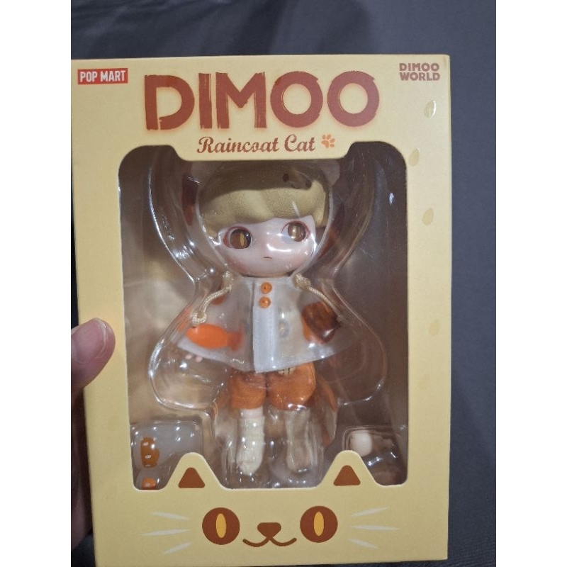 Dimoo raincoat cat figure