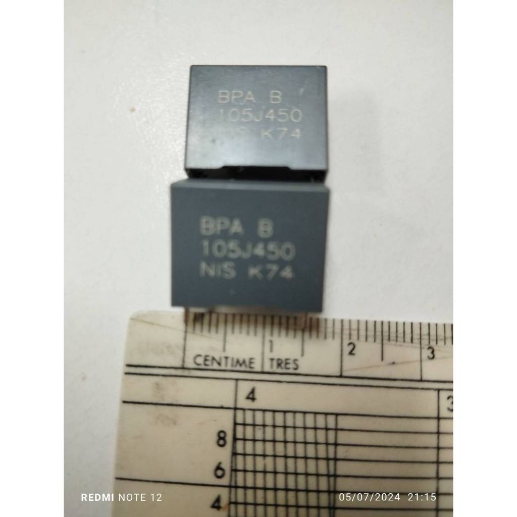 โพลี 1UF 450V Capacitor ขาห่าง 15 มิล ตัวสีเทา ยี่ห้อ NISSEI Japan Cโพลี 105K450V 105PF คาปาซิเตอร์