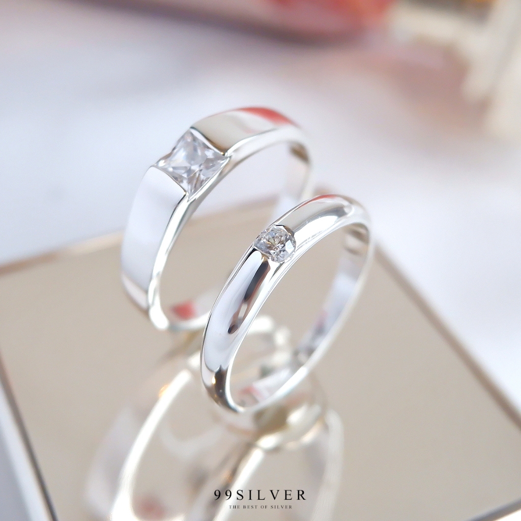 แหวนคู่รัก เพชรเม็ดเหลี่ยม Diamond Cut และเพชรเม็ดเกลม 2.5 มม. เรือนโค้ง (ได้แหวน 2 วง) (R9-12)