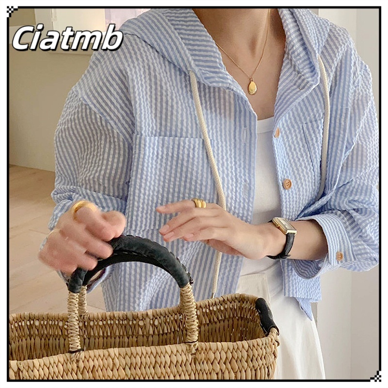 Ciatmb เสื้อเชิ้ตแขนยาวทรงหลวมนางสาว ลายทางเสื้อเชิ้ตมีหมวกปุ่ม เสื้อผ้าป้องกันแสงแดดระบายอากาศได้ดี
