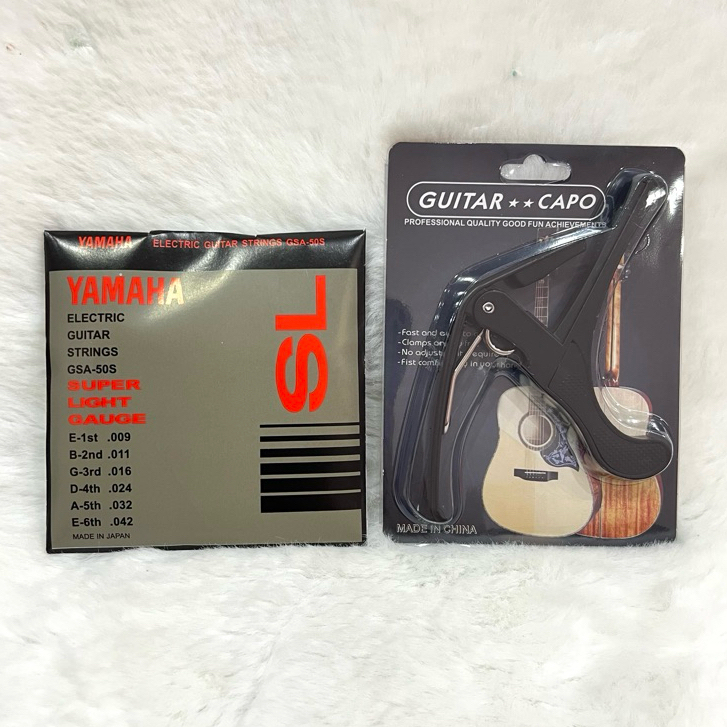 set สุดคุ้ม สุดประหยัด สายกีตาร์ไฟฟ้า Yamaha +คาโป้เหล็กอย่างดี ราคาสบายกระเป๋าแต่คุณภาพสุดยอด สินค้าคุณภาพดีพร้อมส่ง