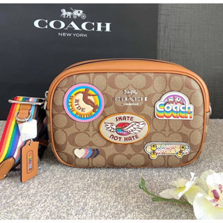 (ผ่อน0%) กระเป๋าสะพายข้าง Coach Jamie Camera Bag In Signature Canvas With Patches CJ605 ลายซีสีน้ำตาล 9 นิ้ว สายสีรุ้ง