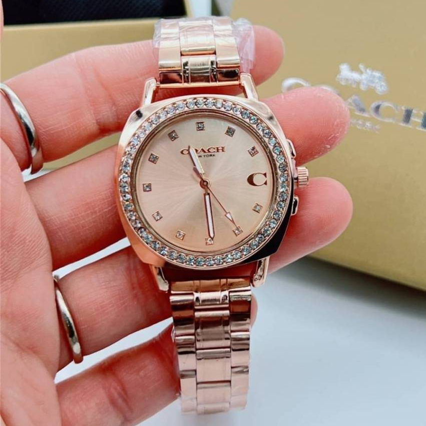นาฬิกาข้อมือผู้หญิง C.o.a.c.h. watch สายสแตนเลสหน้าปัดเพชร สายพิ้งค์ สาย2K