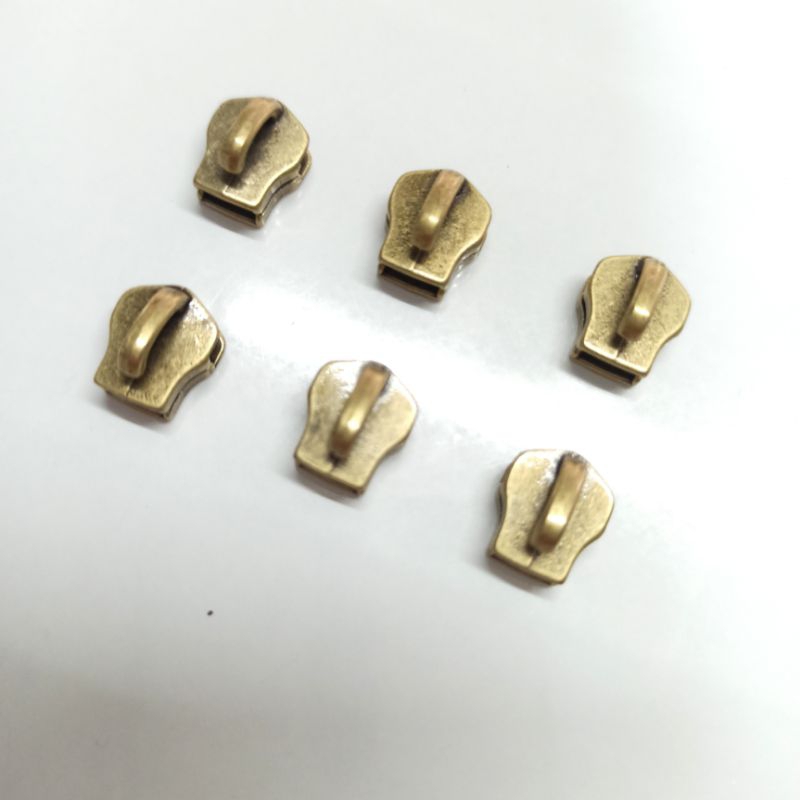 หัวซิปเปล่าฟันเหล็ก/ไนล่อนเบอร์5/สีเหลืองรมดำ(แพ็ค5ชิ้น)
