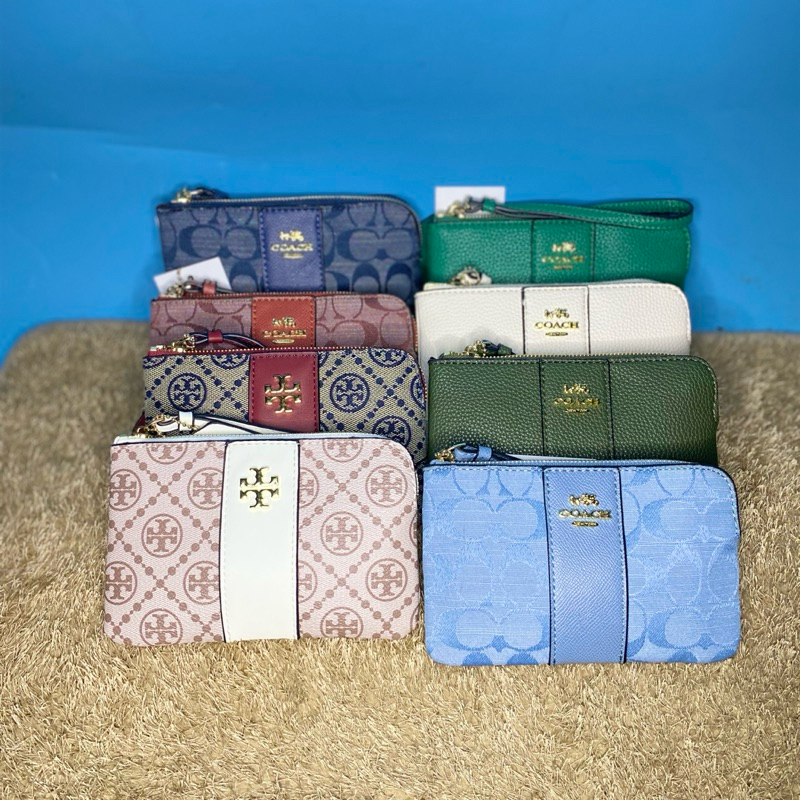 กระเป๋าข้อมือ coach โคล โทรี่ กระเป๋าคล่องแขนเป็นผ้ากับเป็นหนังสินค้าตามรูปภาพเลยครับสินค้าขายดีมาก