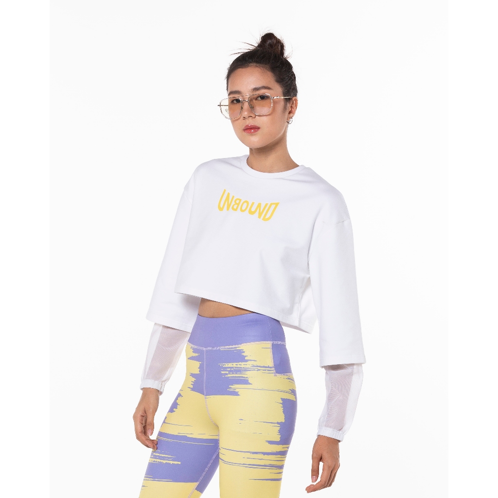 UNBOUND NATURE LAYER SWEATSHIRT-WHITE เสื้อครอปแขนยาวสีขาว ปลายแขนผ้าตาข่าย