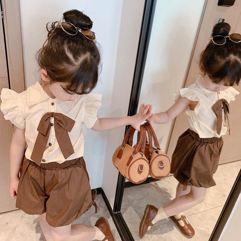 Babyonline(Y098)E2 (ส่งด่วน1วัน)ชุดเซ็ตเสื้อแขนสั้นคอปกแต่งโบว์พร้อมกางเกงขาสั้นทรงบอลลูนสุดน่ารัก ผ้าฝ้าย นิ่ม รูปที่ 2