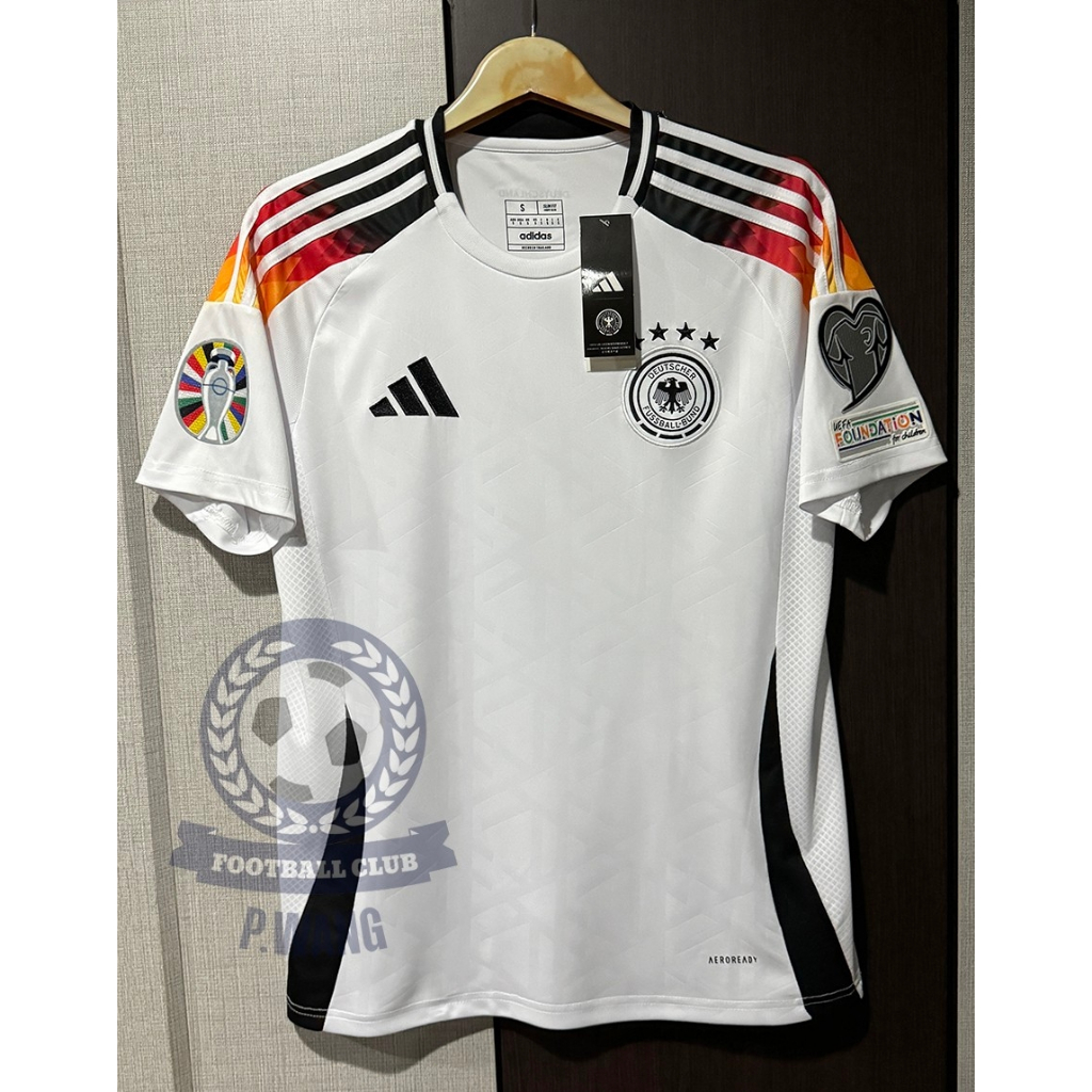 New!! เสื้อฟุตบอล ทีมชาติเยอรมัน Home ชุดเหย้า ยูโร 2024  [ 3A ] เกรดแฟนบอล สีขาว เสื้อเปล่าพร้อมอาร์ม ยูโร 2 ข้าง