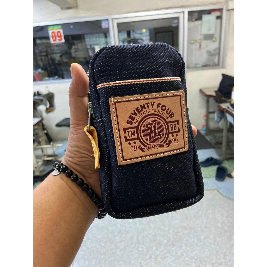 23-MB /Purpose Bag กระเป๋าใส่โทรศัพท์-ผ้า23ออนซ์ (ซิป1ช่อง)แบบติดป้ายหนัง/ มีตะขอเกี่ยว.