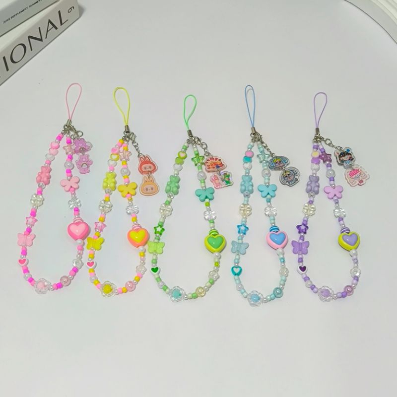 สายคล้องโทรศัพท์จี้ลาบูบู้ cry baby แคร์แบร์ มีหลายหลายแบบให้เลือก สามารถเลือกลายเองได้ พวงกุญแจแฟชั่น