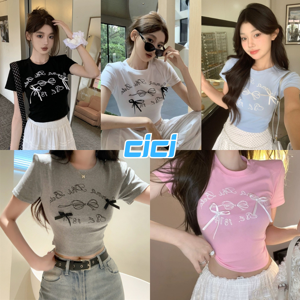 ส่งทันที Cici (NO. 93168)เสื้อยืดครอปท็อป คอกลม สกรีนตัวอักษร  ผ้าเรยอน ประดับโบว์ น่ารักสไตล์สบายๆ