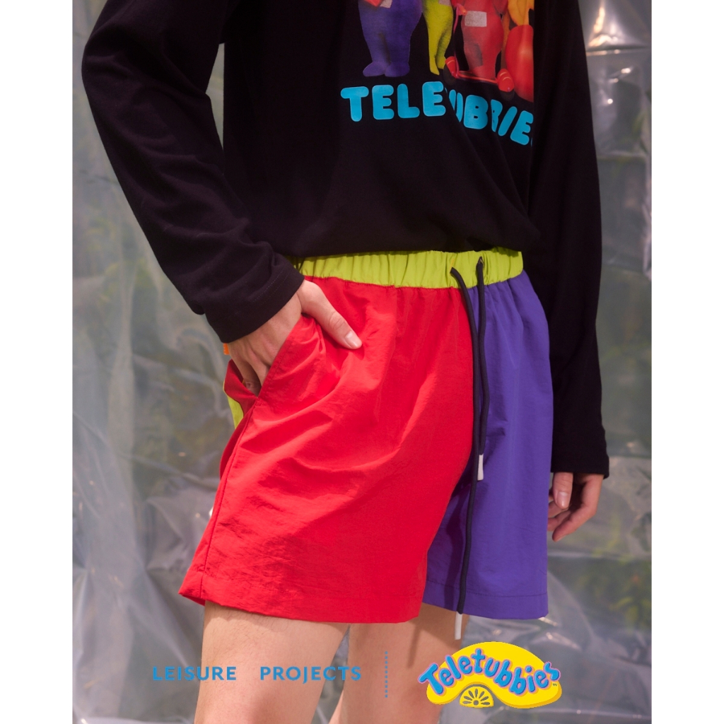 (Leisure Projects) x Teletubbies patchwork shorts กางเกงเอวยางยืด ผ้า nylon ตัดต่อหลากสี ดีเทลโลโก้ teletubbies ปักที่ชา