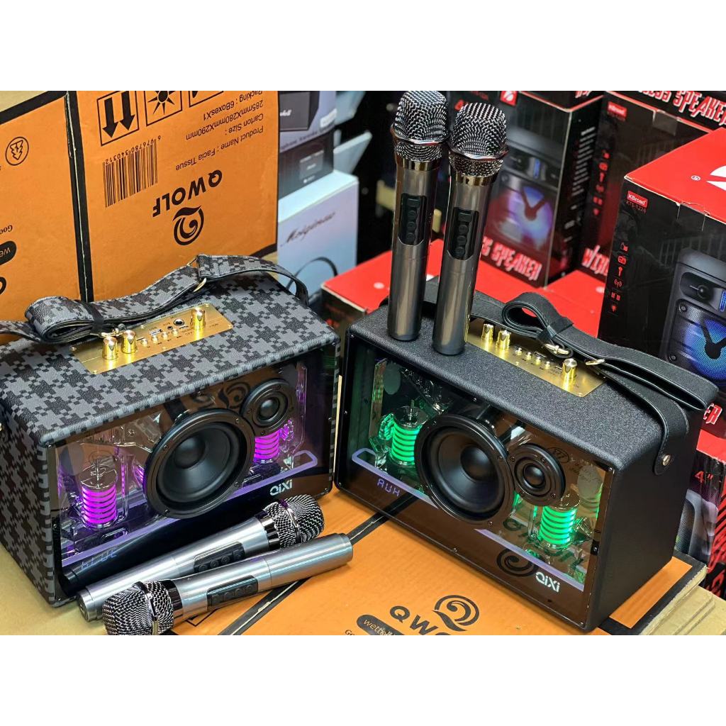 ลำโพงบลูทูธรุ่น SK-2066A แถมไมค์ลอย 2ตัว ตู้โปร่งใส เสียงเบสแนน รองรับ AUX TF USB มีสายสะพาย