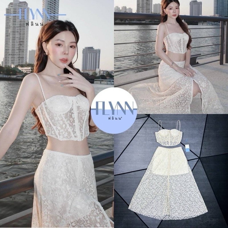 Flynn เซ็ทเสื้อครอปลูกไม้ แต่งสายเก๋เก๋ทำจากผ้าลูกไม้ มาคู่กับเดรสสั้นแต่งคลุมด้วยผ้าลูกไม้