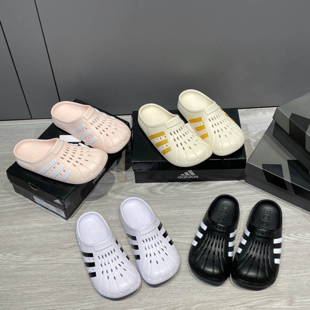 Adidas ADILETTE CLOG cavernous รองเท้าแตะลําลอง ระบายอากาศ เหมาะกับเดินชายหาด สําหรับผู้ชาย ผู้หญิง