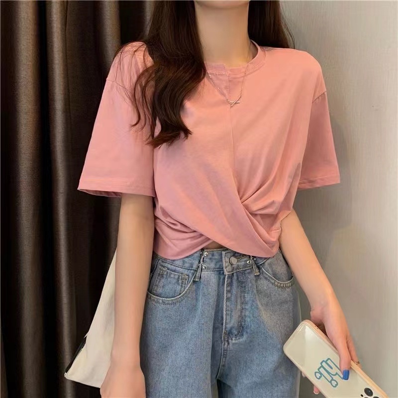 เสื้อคอกลมหลวมพอดีกับเสื้อยืดแขนสั้นแบบใหม่ผู้หญิงสีทึบผิดปกติ