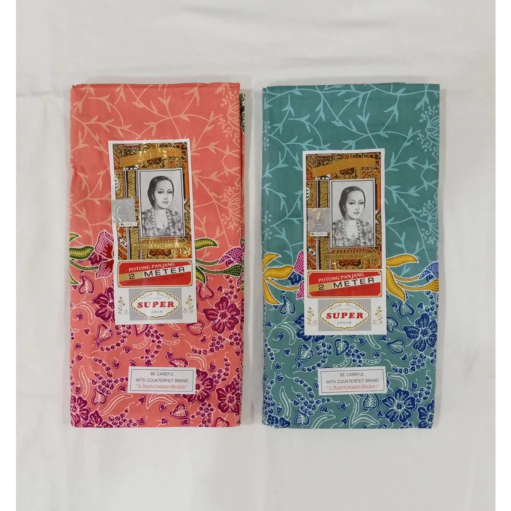 แพ็คคู่ 2 ผืน!!!! คอตตอน แท้ 100 % ผ้าถุงตรา เจ้าหญิง ซุปเปอร์ RATNA DEWI ( สีโอรส) + สีเขียวหยก ) เย็บเเล้ว (SET 45)