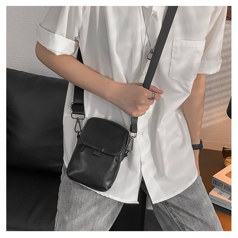 มาใหม่ กระเป๋าสะพายข้าง กระเป๋าใส่มือถือ crossbody bagคาดหน้าอกใบเล็ก มีสไตล์ หนังPU กันน้ำ ผู้ชาย ผู้หญิง รุ่น 2014