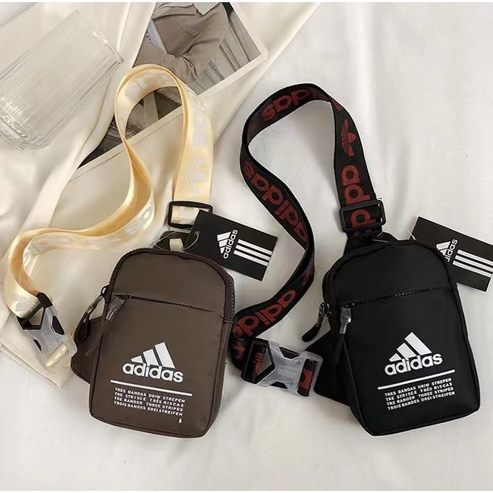 ADIDASกีฬากลางแจ้งสำหรับบุรุษและสตรีและกระเป๋าสะพายไหล่ขนาดเล็กในแนวทแยงกระเป๋าเป้สะพายหลังขนาดเล็ก