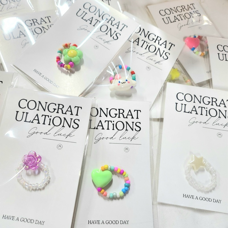 ของขวัญวันปัจฉิม การ์ด+แหวนลูกปัด congratulations พร้อมแพ็คเกจน่ารักทุกลาย (ร้านส่งคละลาย)