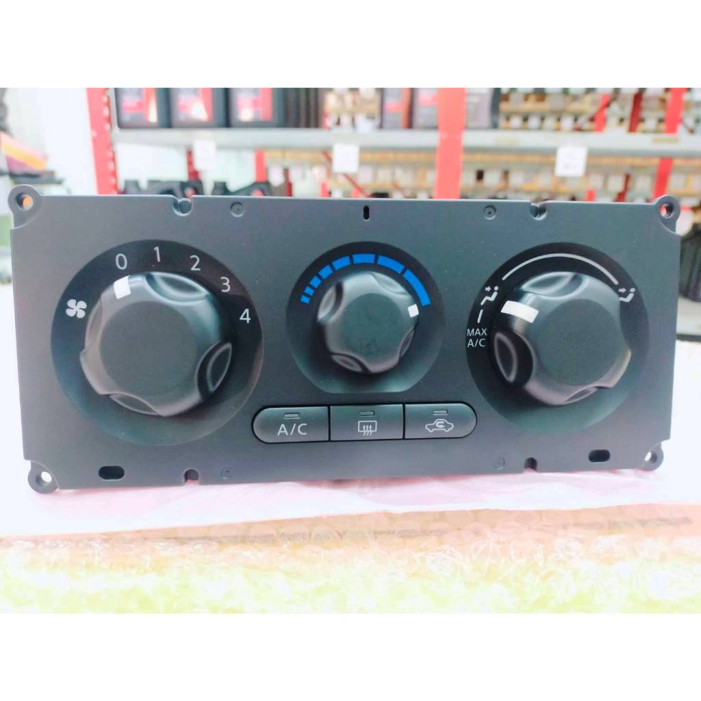ชุดสวิทช์ควบคุมแอร์ สำหรับ NISSAN NAVARA (D40) **ยกเว้น D40 ตอนเดียว** สินค้าอะไหล่แท้นิสสัน (27510-EB700)