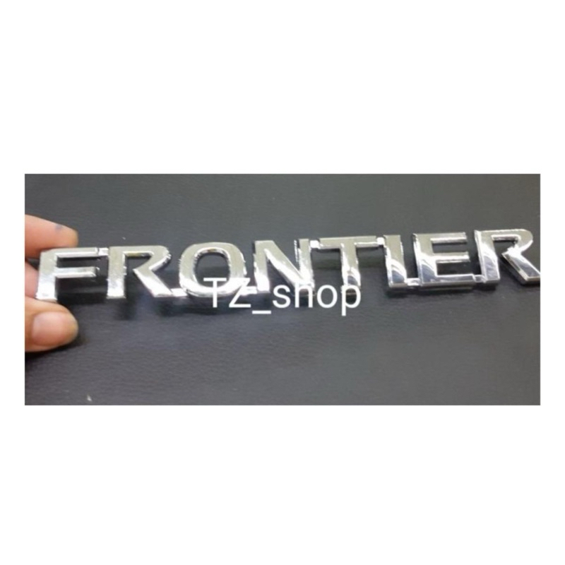 โลโก้ frontier ของรถ nissan navara