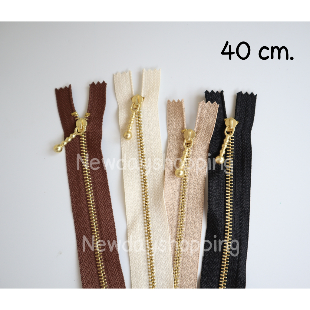 ซิป เบอร์ 3 หัวลูกตุ้ม สีทอง ยาว 40 cm.