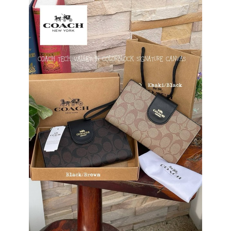 กระเป๋าคล้องมือ Coach  TECH WALLET IN SIGNATURE CANVAS  (พร้อมส่งที่ไทย)ลดราคา