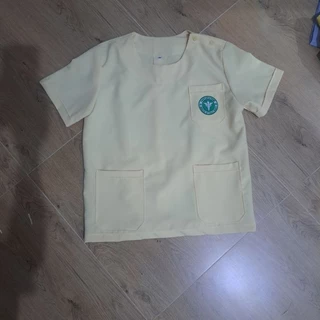 #เสื้อผู้ช่วยคนไข้คอกลมกระดุมบ่าสีเหลืองเกรดA