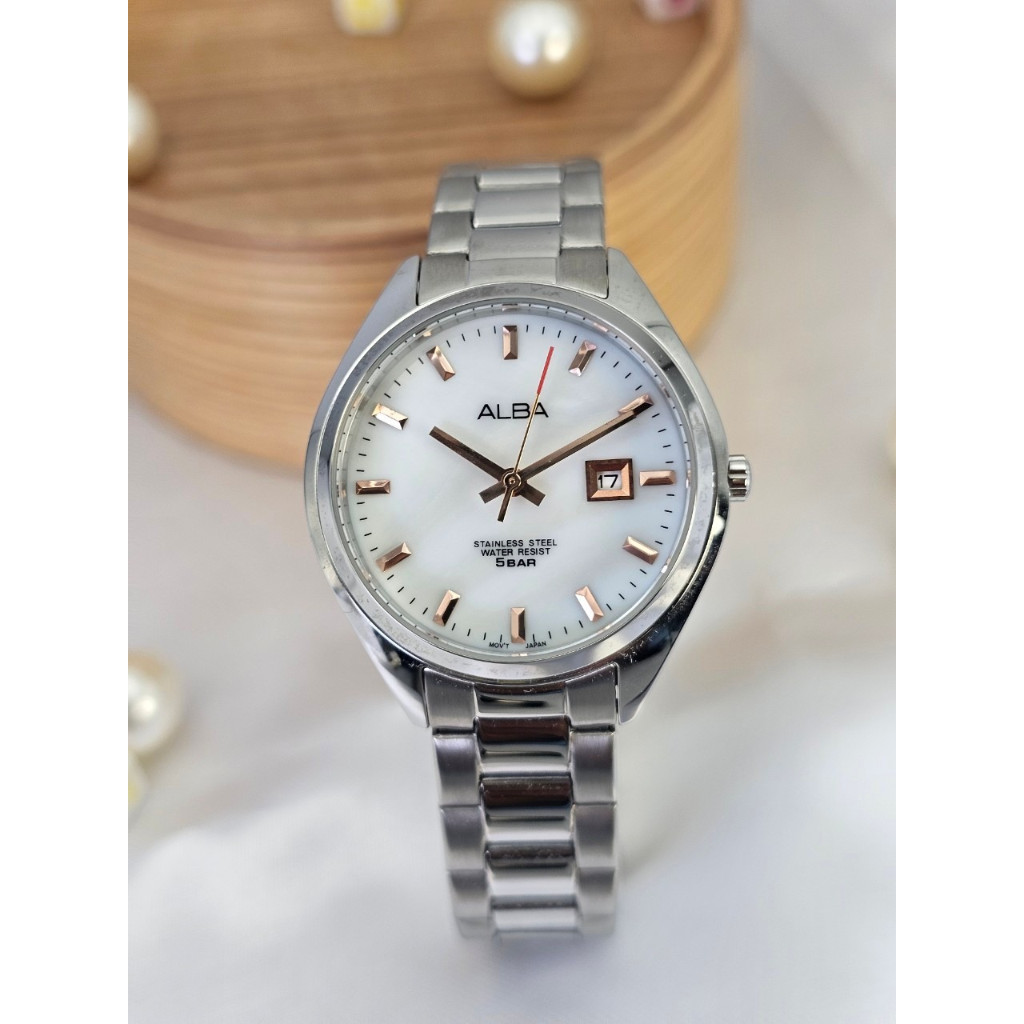ALBA  Japan  รุ่น AH7011X1 นาฬิกาข้อมือ(ผู้หญิง) หน้าปัดมุกขาว ช่องวันที่ รับประกันศูนย์