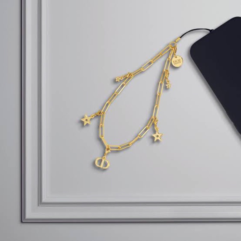 พร้อมส่ง🌙ที่ห้อยมือถือ Dior gold phone charm