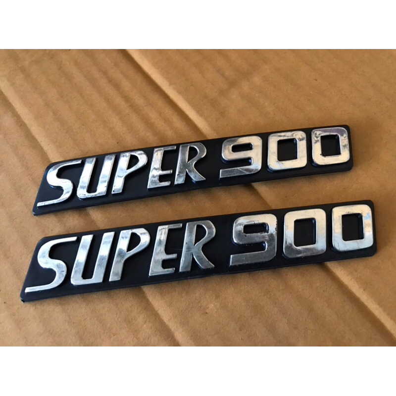 โลโก้ฝากระเป๋า Honda c900 นันทิดา