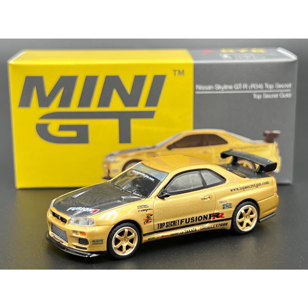 MINIGT Nissan Skyline GT-R (R34) Top Secret  Top Secret Gold