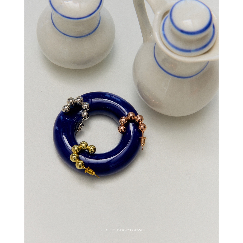 Julys - caterpillar stud earrings