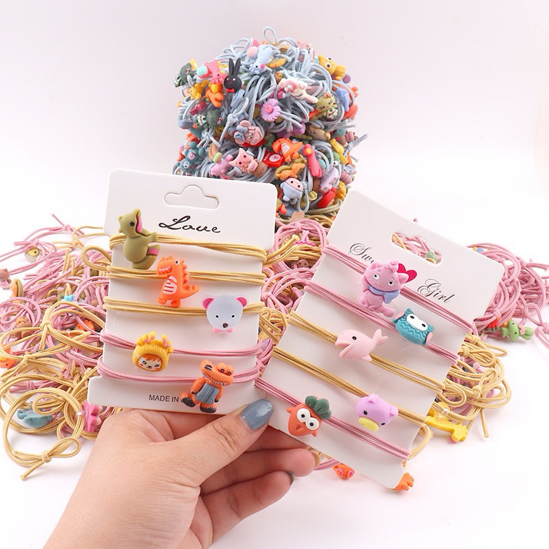 50-100 เส้น ยางรัดผมการ์ตูนสุ่มลายน่ารักๆ เครื่องประดับผม พร้อมส่งในไทย